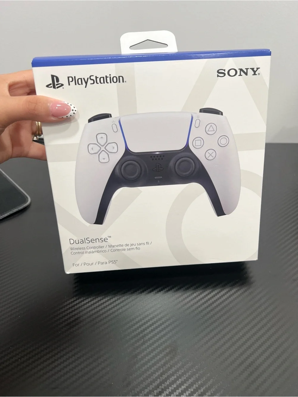 Sony DualSense Wireless Controller — White with Black Accents and Blue Trim
